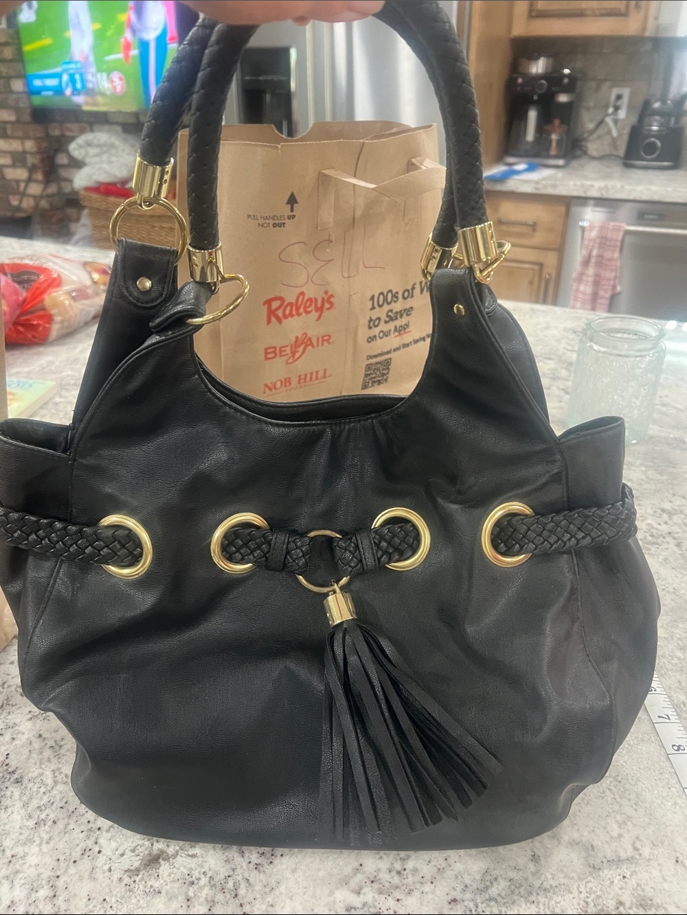 Black Leather Tote Bag with Braided Handles and Tassel